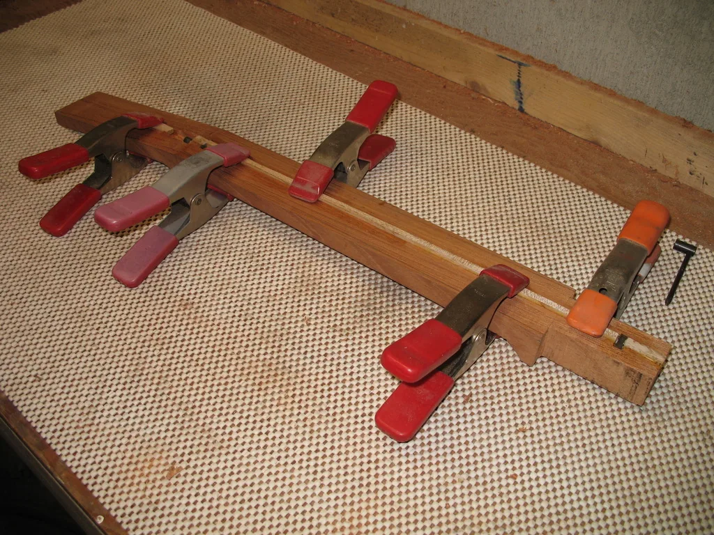 Black walnut top pieces glued and clamped together
