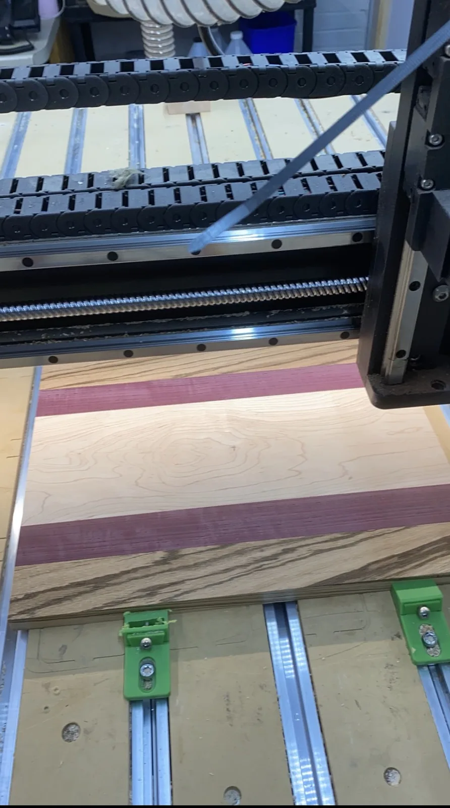 Contrasting purpleheart, maple, and zebrawood selected for the cutting board