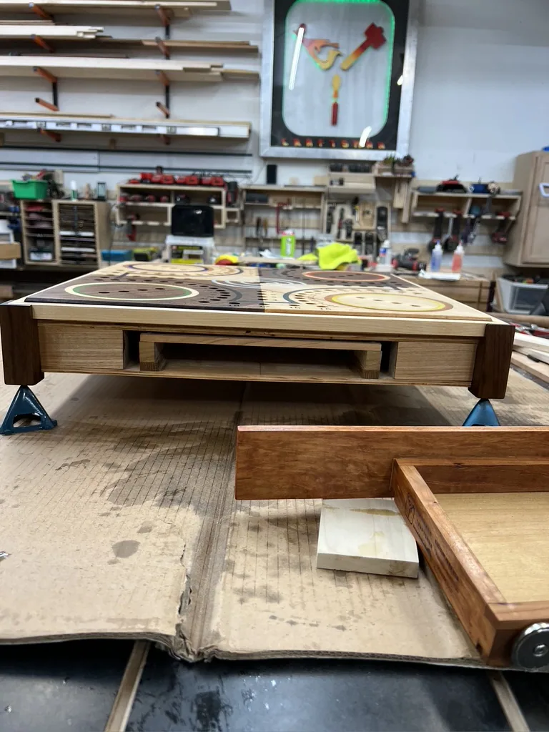 Side of the stand where the hidden drawer lives