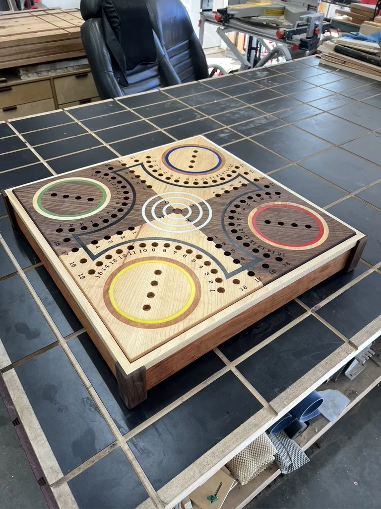 Finished Tock game board with colored inlay on its custom wooden stand
